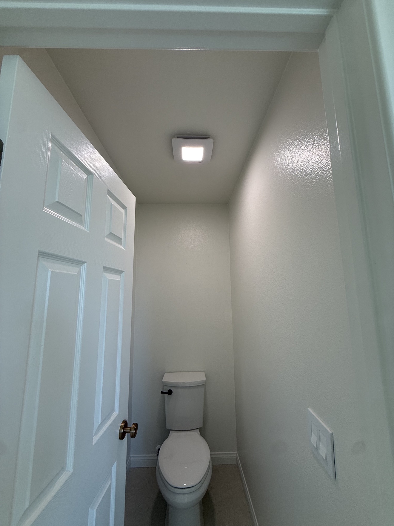 Bathroom exhaust fan with LED light installed