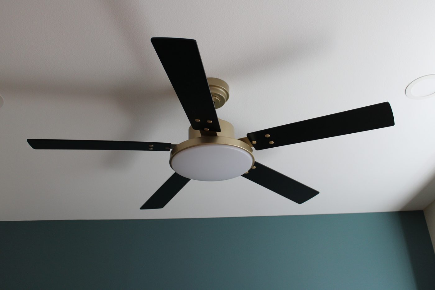 Ceiling fan installation on wood patio cover